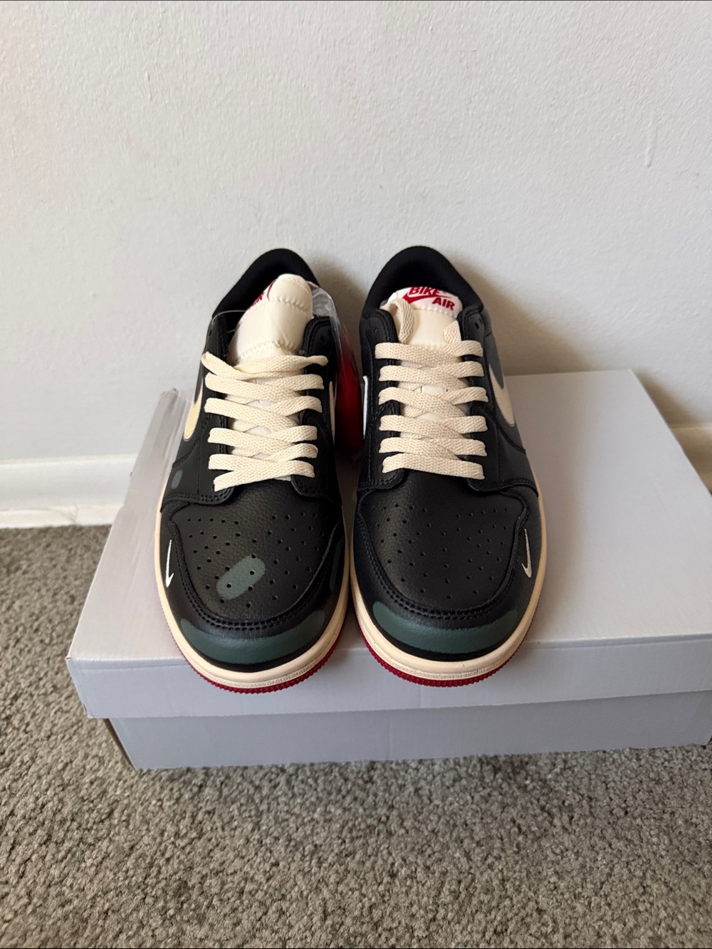 Nike Low-Top Sneakers in Black, Cream, Green, and Red
